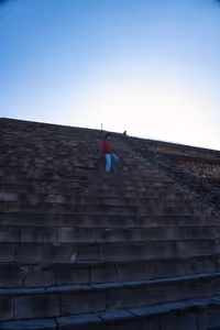 Aarav carefully climbs down