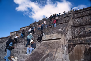 Climbing the steep steps of the Pyramid of the Moon