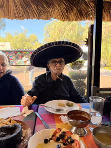 Appa borrowed a hat from a Mariachi band member at lunch.