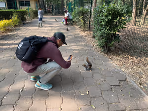 A flock of overly friendly squirrels inhabited the park. If you stared at them, they would approach you, and climb onto you, demanding to be fed. Squirrel attack!