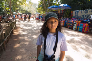 Tejas taking in the very commercial vendors lining every part of Chichén Itzá